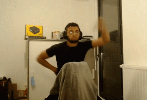 Man With Headphones and Glasses in Front of Xbox 360 Box