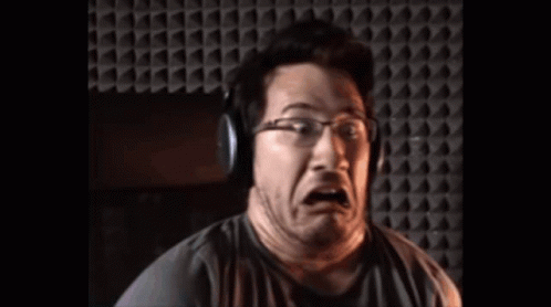 Man With Headphones and Glasses Making Funny Face