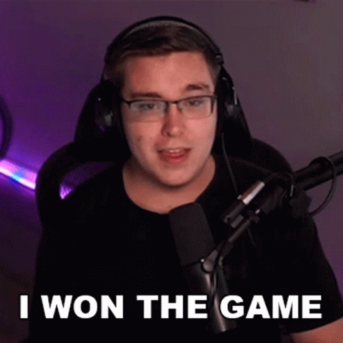 Man With Headphones and Glasses Saying I Won the Game
