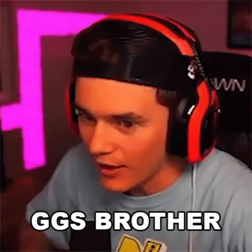 Man With Headphones and Hat Saying GGs Brother in Front of Mic
