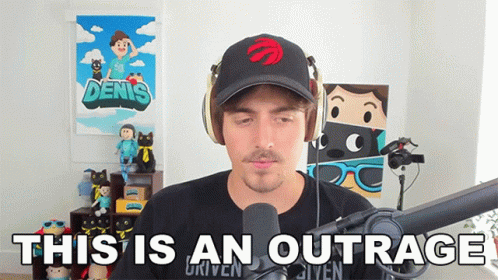Man with Headphones and Hat Says Outrage