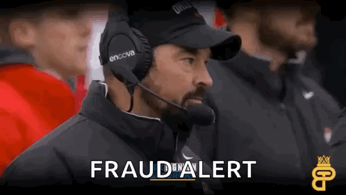 Man With Headphones and Mic Saying Fraud Alert