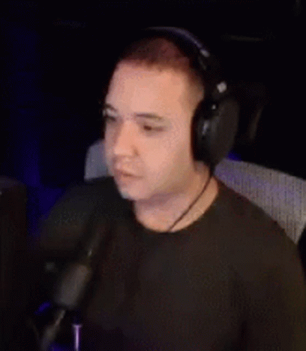 Man With Headphones And Microphone At Computer GIF