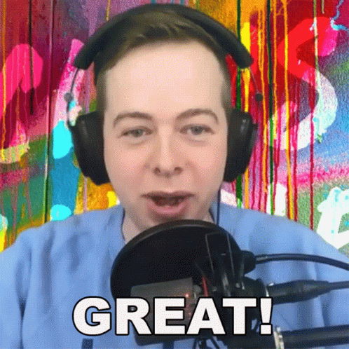 Man With Headphones and Microphone Saying Great