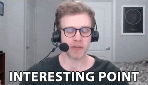 Man With Headphones and Microphone Says Interesting Point