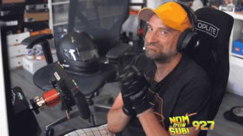 Man With Headphones And Oplite Hat GIF