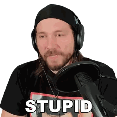 Man With Headphones And Stupid Shirt