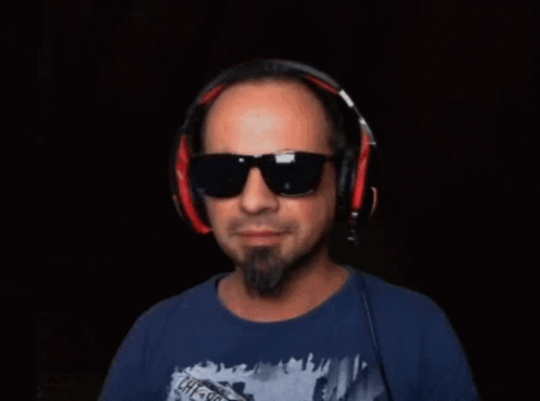 Man with Headphones and Sunglasses Dancing