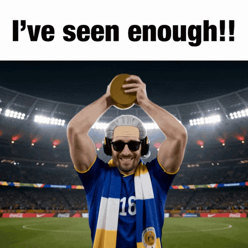 Man With Headphones and Sunglasses Holding Trophy Saying I've Seen Enough