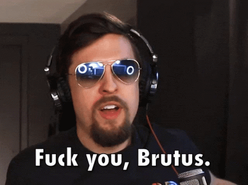 Man With Headphones and Sunglasses Saying Fuck You Brutus