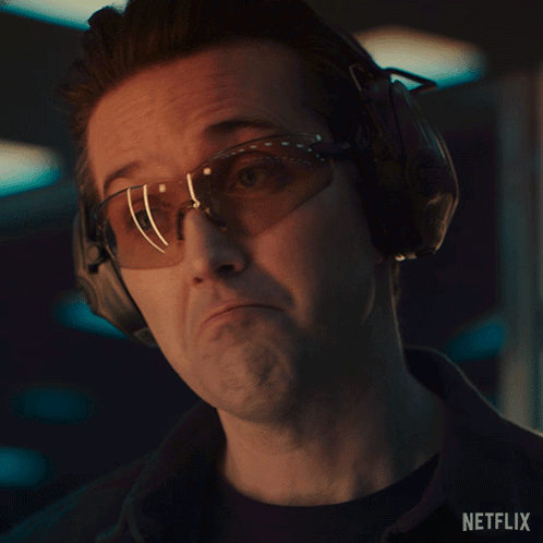 Man with Headphones and Sunglasses Saying Nothing