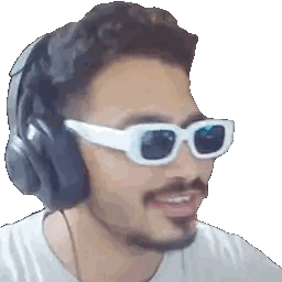 Man with Headphones and Sunglasses Smiling