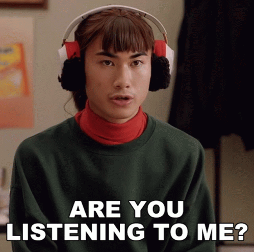 Man with Headphones Asking If Listening