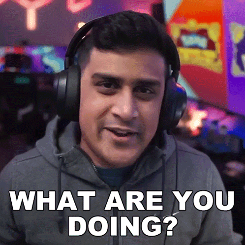Man with Headphones Asks What Are You Doing