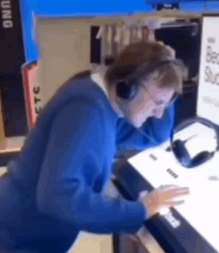 Man With Headphones At Computer GIF