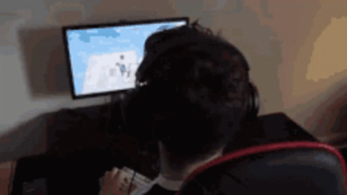 Man With Headphones at Computer
