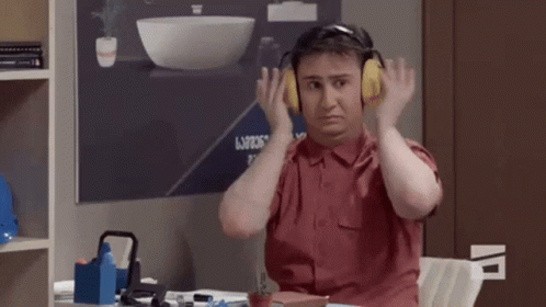 Man with Headphones at Desk