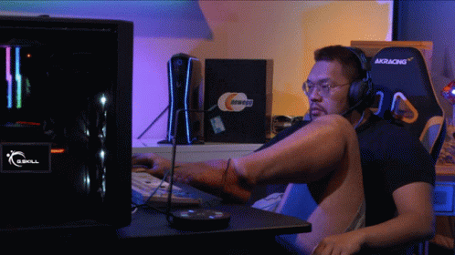Man With Headphones At G.Skill Computer GIF