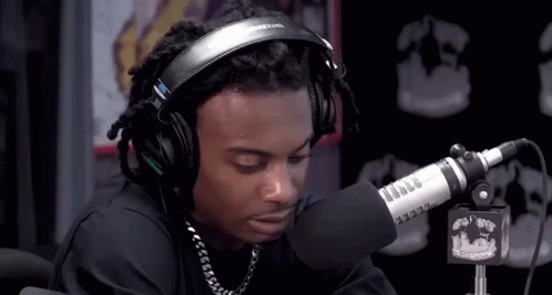 Man with Headphones at Microphone