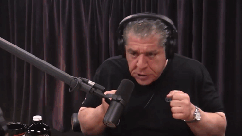 Man With Headphones at Microphone