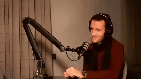 Man With Headphones at Microphone