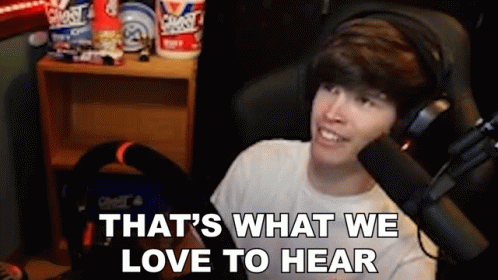 Man with Headphones at Microphone Saying What We Love