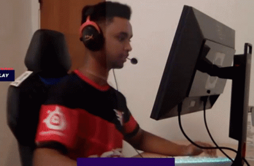 Man With Headphones At Monitor Play GIF
