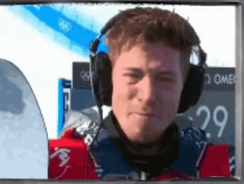Man With Headphones at Scoreboard 29