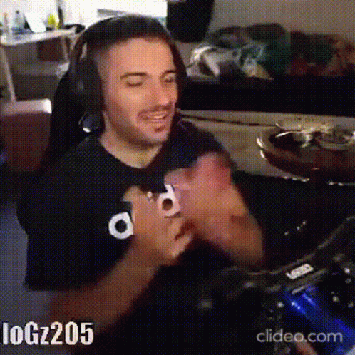 Man With Headphones Clapping While Gaming