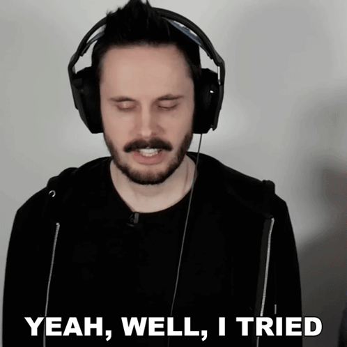 Man With Headphones Eyes Closed Saying Yeah Well I Tried
