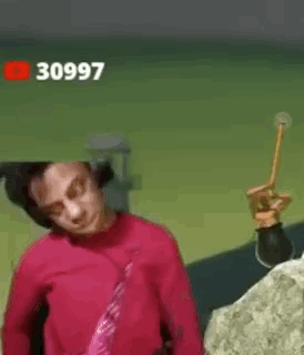 Man With Headphones Holding Hammer Making Funny Face GIF