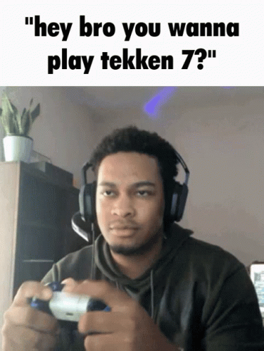 Man With Headphones Holding Video Game Controller GIF