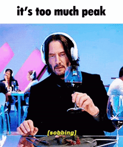 Man With Headphones Holding Wine and Food