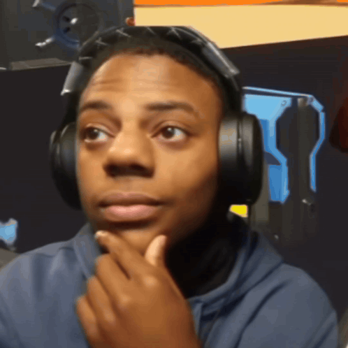 Man With Headphones Looking at Camera