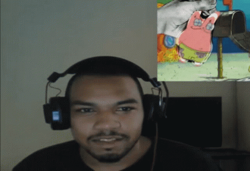 Man With Headphones Looking at Patrick Star
