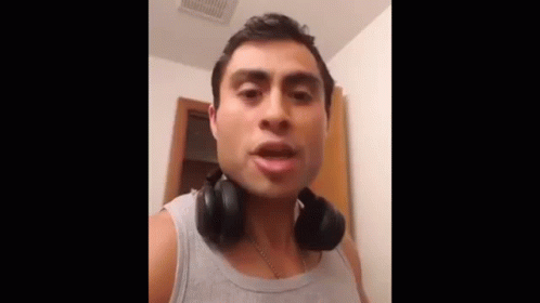 Man With Headphones Making Funny Face