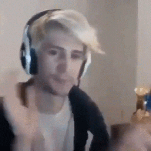 Man with Headphones Making Funny Face Gaming