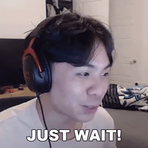 Man With Headphones Making Funny Face Saying Just Wait