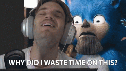 Man With Headphones Next To Blue Stuffed Animal Saying Why Did I Waste Time On This GIF