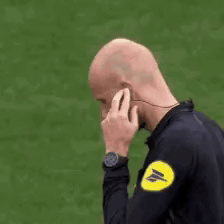 Man With Headphones on Cell Phone in Field