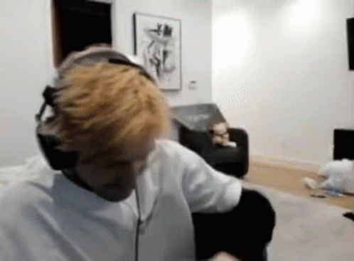 Man With Headphones on Couch