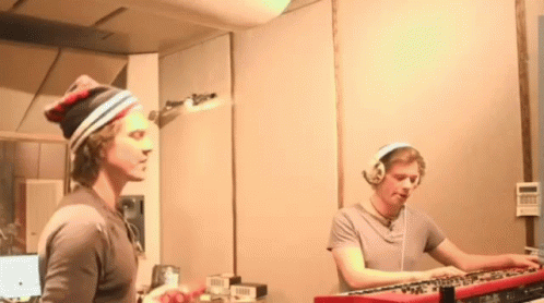 Man With Headphones Playing Keyboard