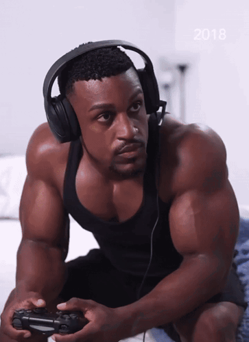 Man With Headphones Playing Video Game 2018 GIF