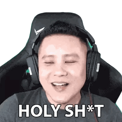 Man with Headphones Saying Holy Sh*t