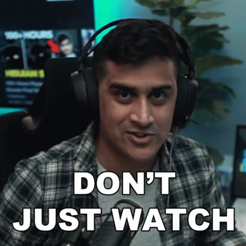 Man with Headphones Says Don't Just Watch