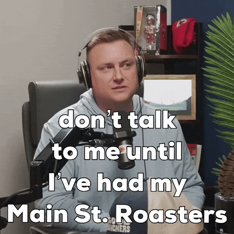 Man With Headphones Says Don't Talk to Me Until I've Had My Main St