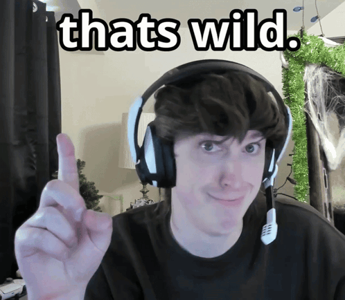 Man With Headphones Thumbs Up Saying Thats Wild GIF