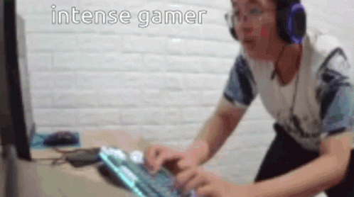Man With Headphones Typing On Keyboard GIF