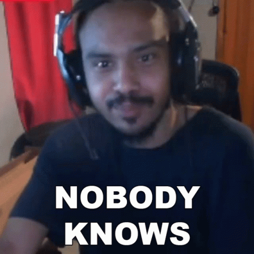 Man With Headphones Wearing Nobody Knows Shirt
