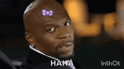 Man with Hello Kitty Bow Saying Haha